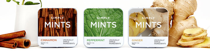 Simply cinnamon mints, peppermint mints, and ginger mints on a white tabletop