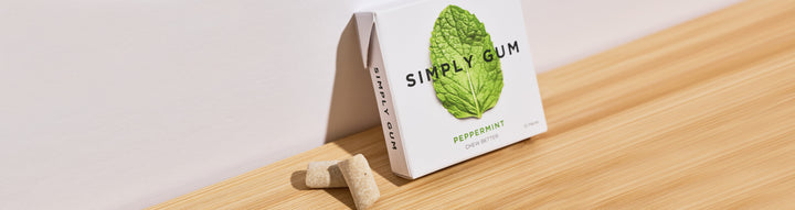 Peppermint gum leaning against a wall