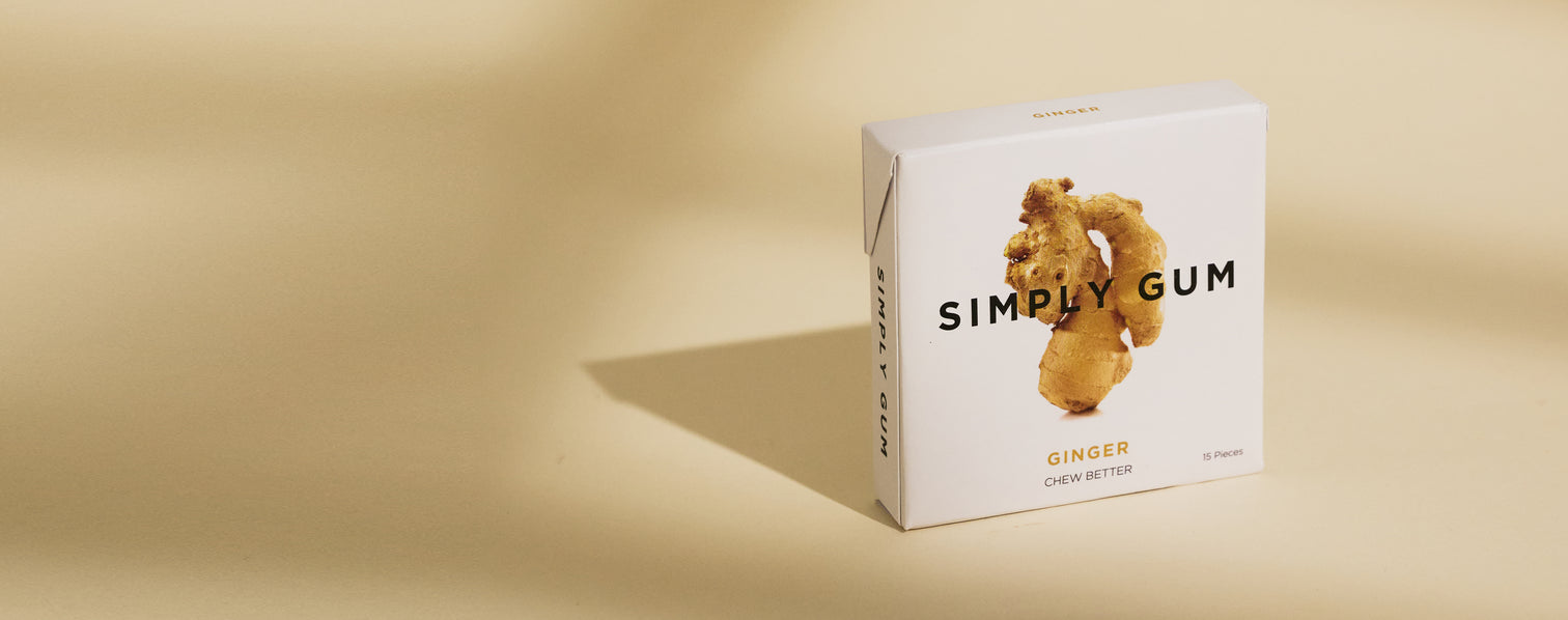 Box of Simply Gum ginger on a beige background